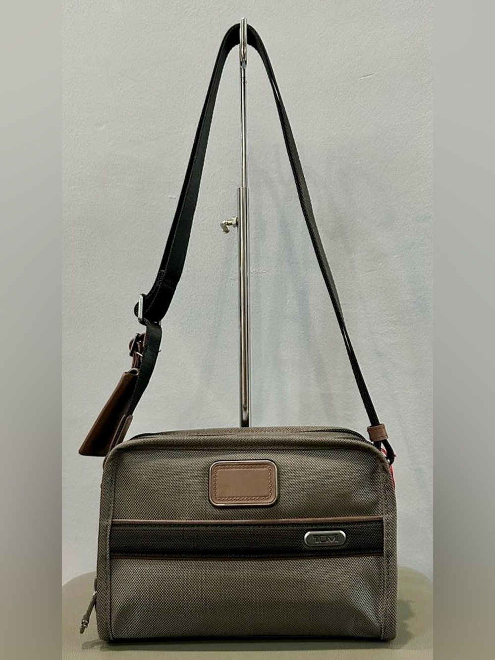 NWT TUMI Gen 4.3 East West Crossbody Castle Rock Gray & Brown